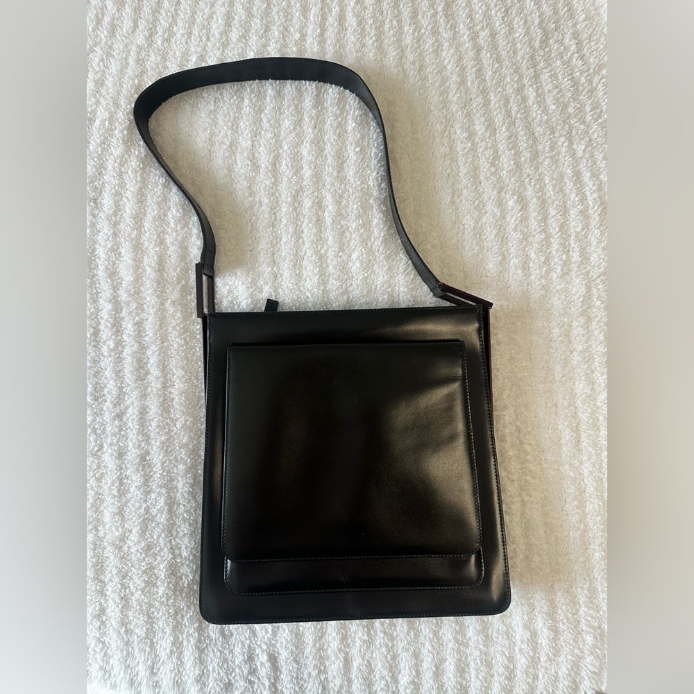 Iconic Gucci Vintage Black Leather Purse with metal side Plaques